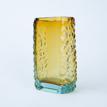 Sunset Gold textured glass vase with a translucent golden body and blue-tinted base