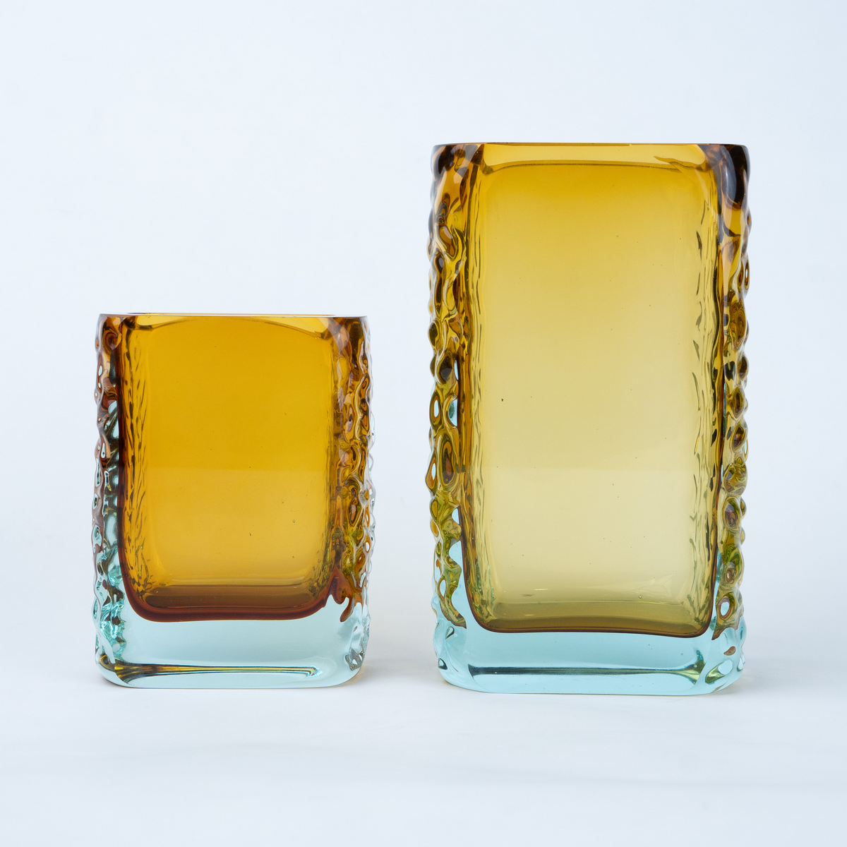 Sunset Gold textured glass vase with a translucent golden body and blue-tinted base