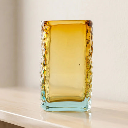 Sunset Gold textured glass vase with a translucent golden body and blue-tinted base