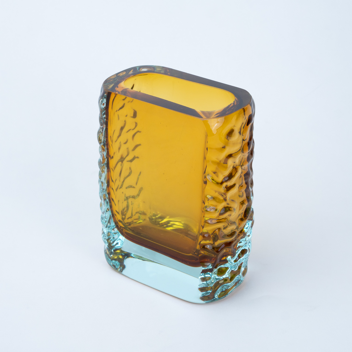 Sunset Gold textured glass vase with a translucent golden body and blue-tinted base