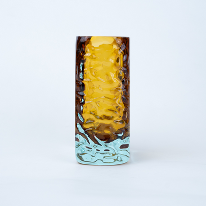 Sunset Gold textured glass vase with a translucent golden body and blue-tinted base