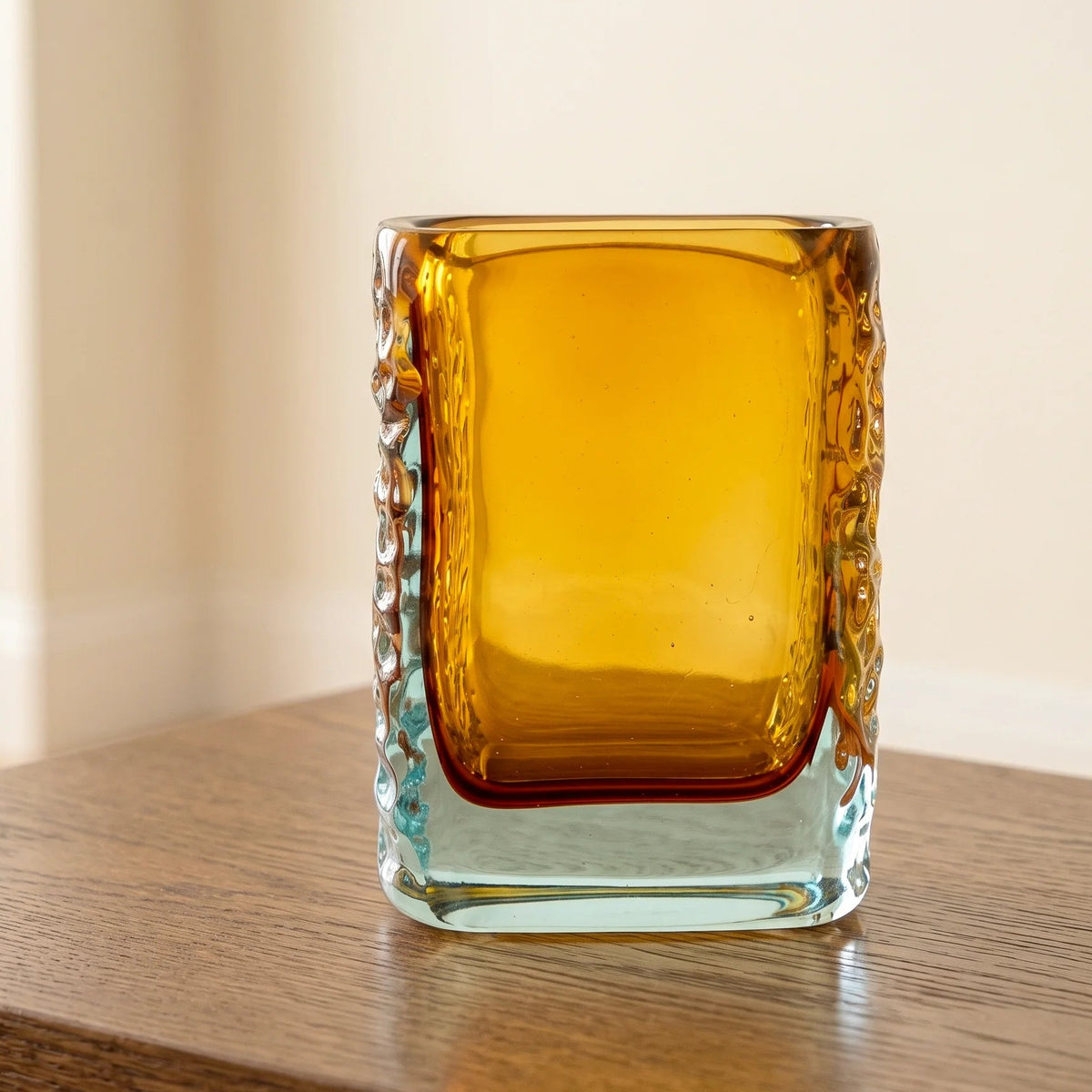 Sunset Gold textured glass vase with a translucent golden body and blue-tinted base