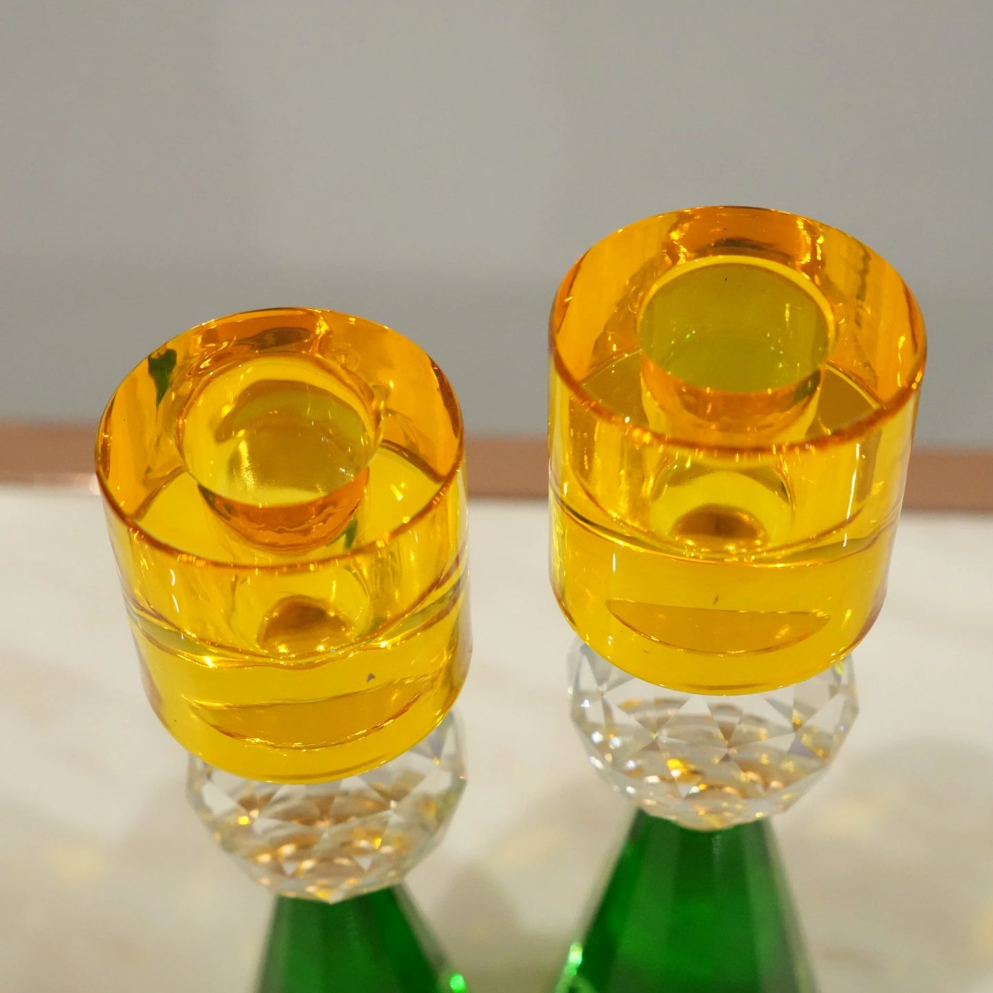 Prism Crystal Candle Holder Duo set with faceted design and crystal sphere accents