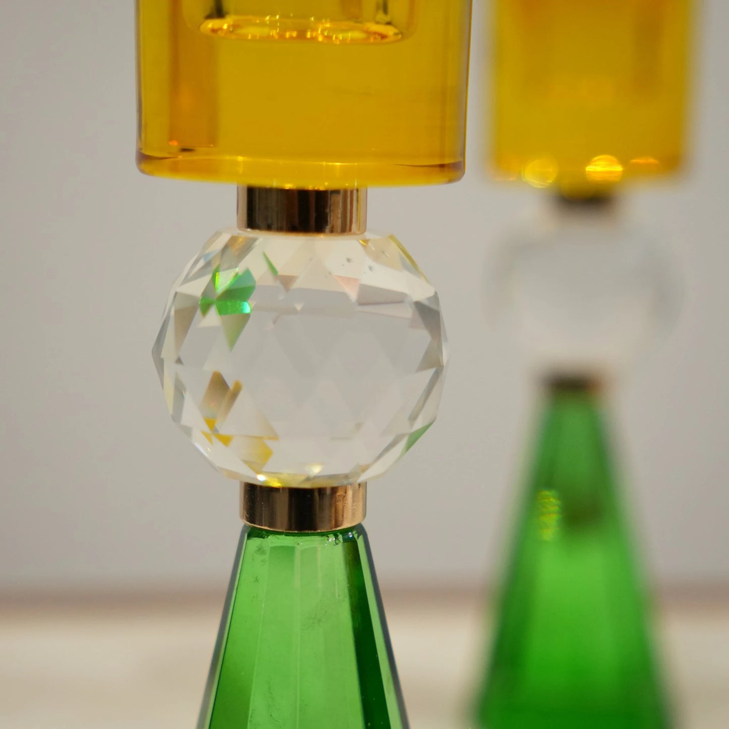 Prism Crystal Candle Holder Duo set with faceted design and crystal sphere accents