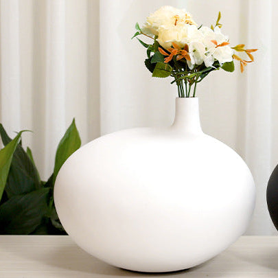 Modern decorative vase with clean organic curves for sophisticated interior styling spaces