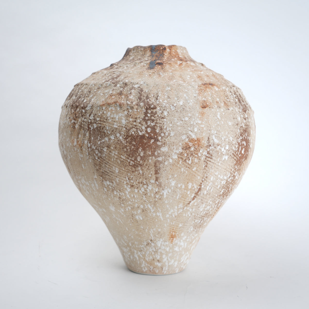Rust patina ceramic vase with textured earthy finish available in small and large sizes for home decor