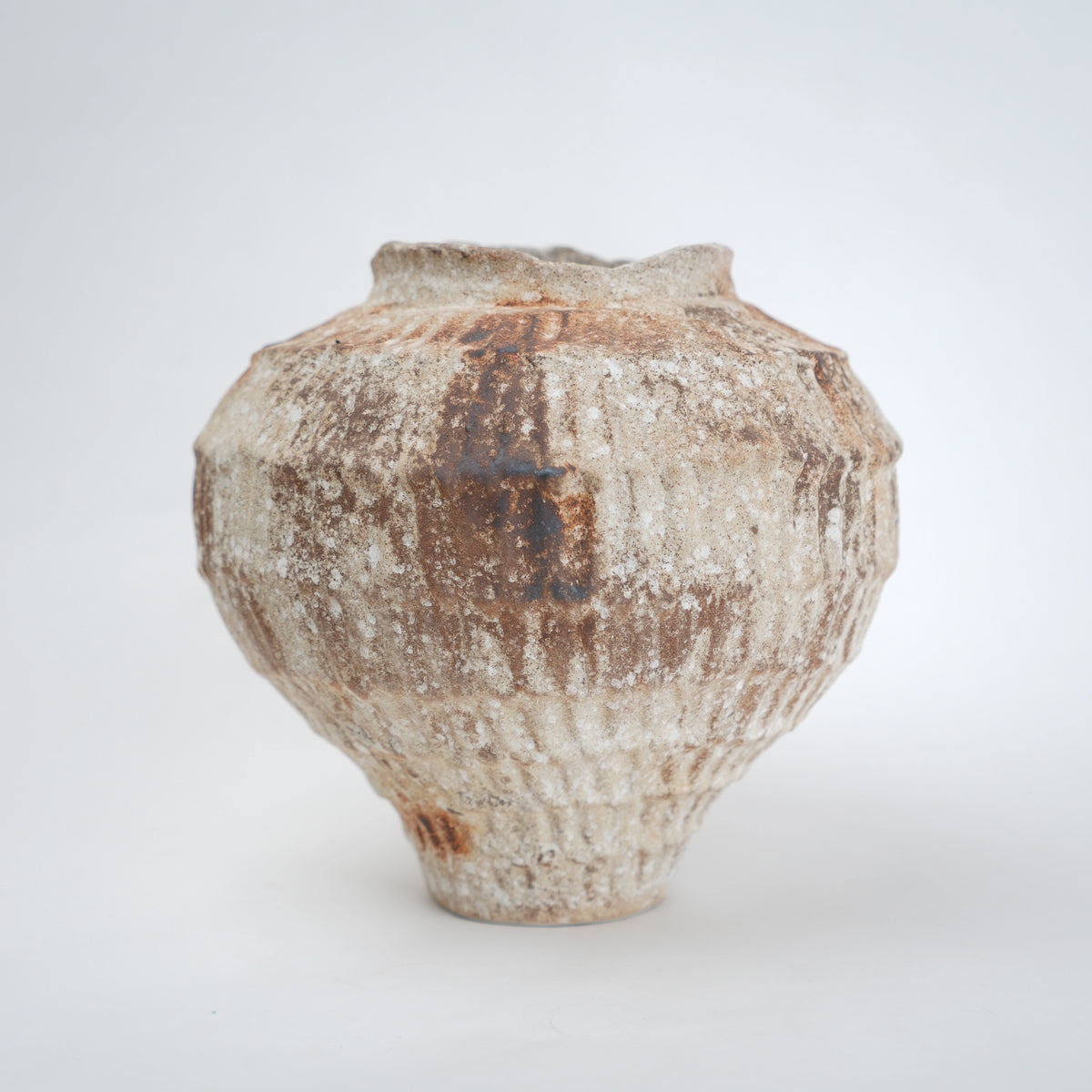 Rust patina ceramic vase with textured earthy finish available in small and large sizes for home decor