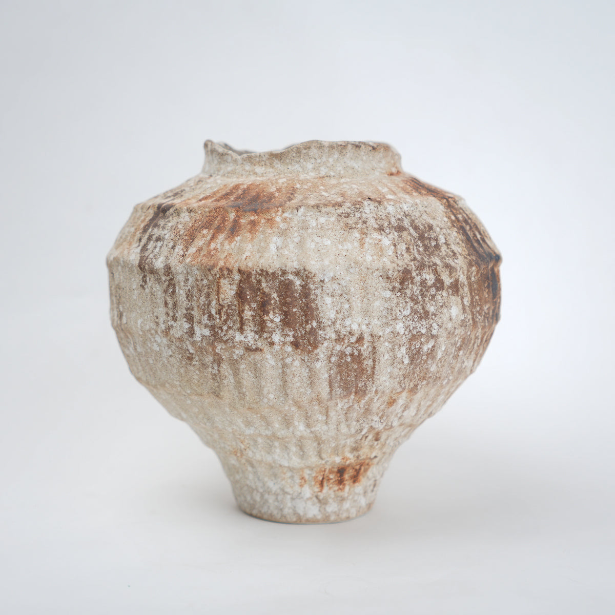 Rust patina ceramic vase with textured earthy finish available in small and large sizes for home decor