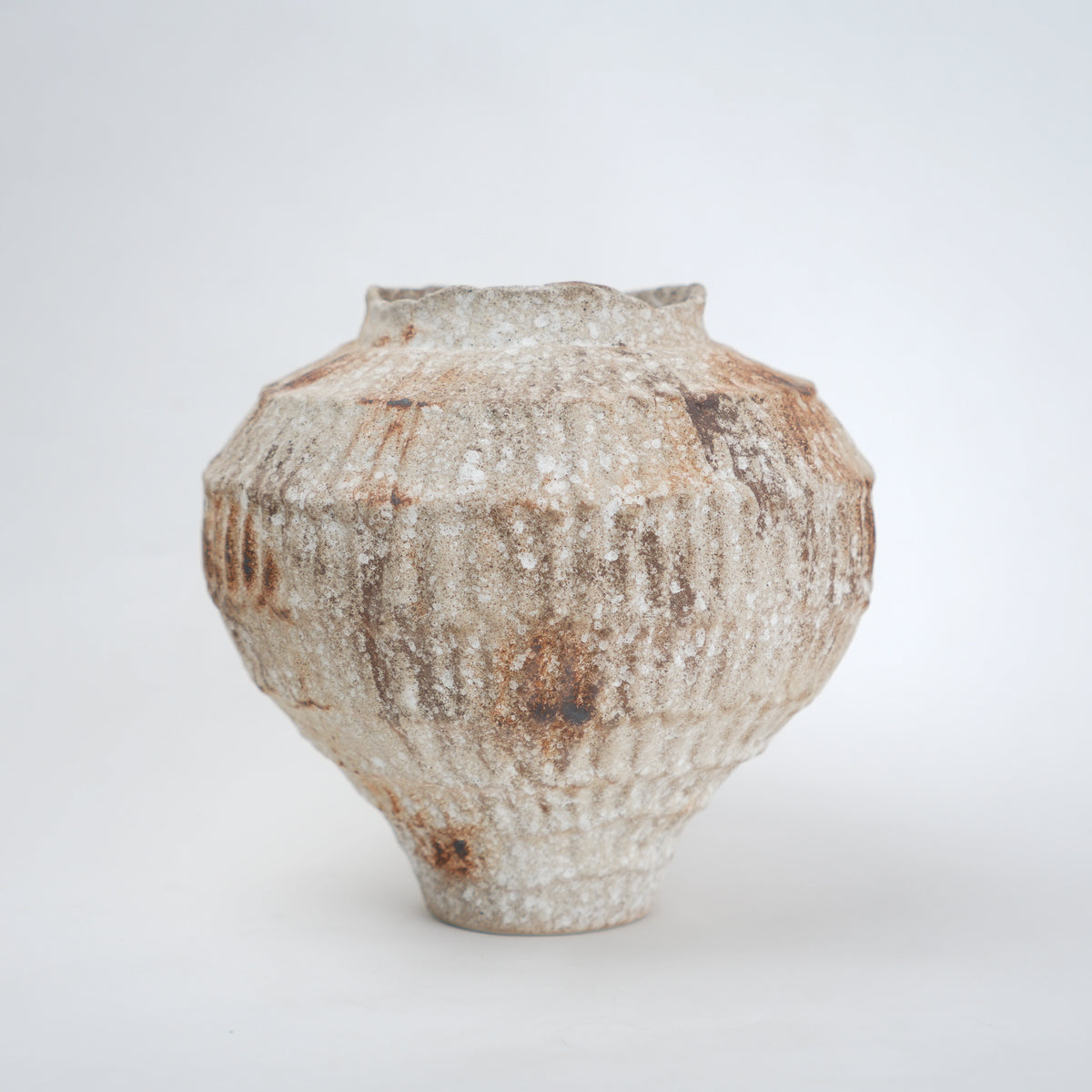 Rust patina ceramic vase with textured earthy finish available in small and large sizes for home decor