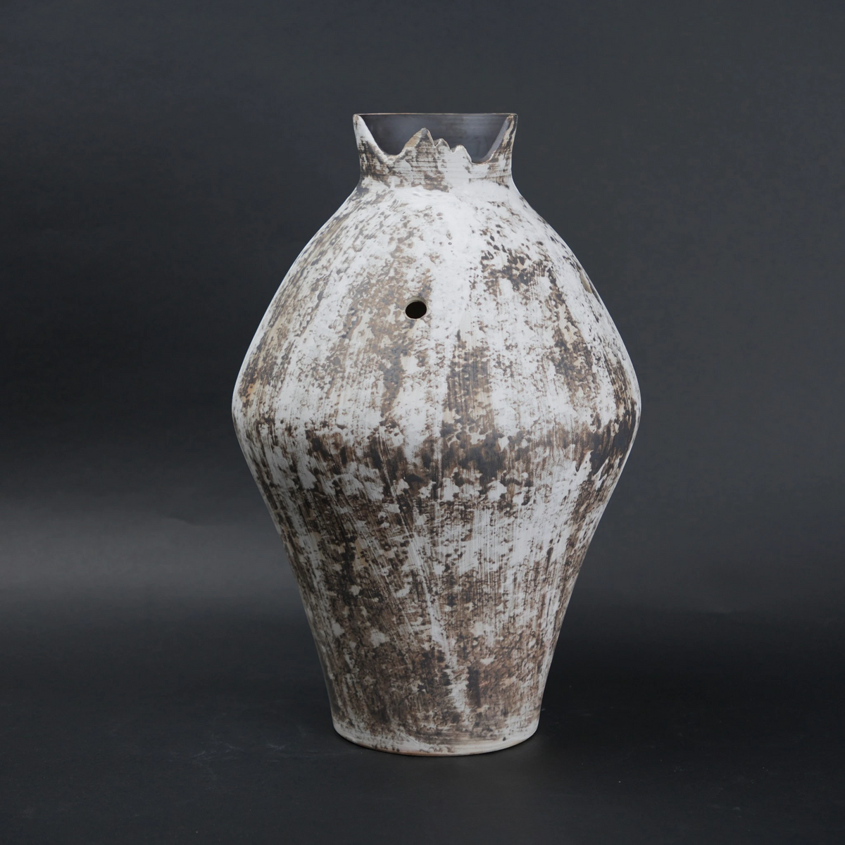 Vintage ceramic vase with a textured surface