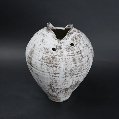 Vintage ceramic vase with a textured surface