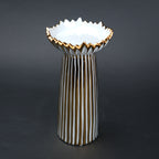 White ceramic candle holder with gold scalloped rim and fluted base for modern home decor styling