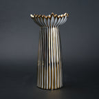 White ceramic candle holder with gold scalloped rim and fluted base for modern home decor styling