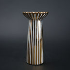 White ceramic candle holder with gold scalloped rim and fluted base for modern home decor styling
