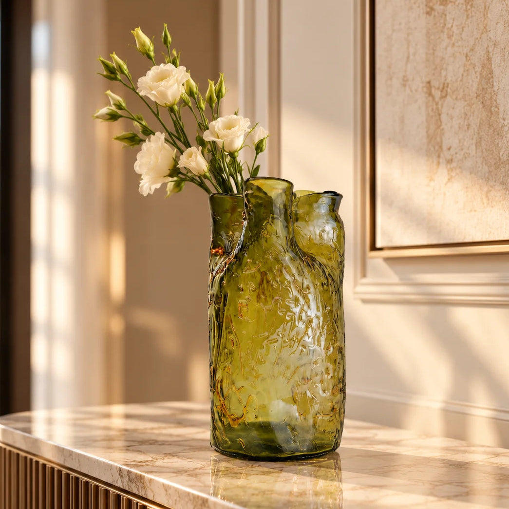 Olive green crackle-textured cylindrical glass vase with organic surface pattern.