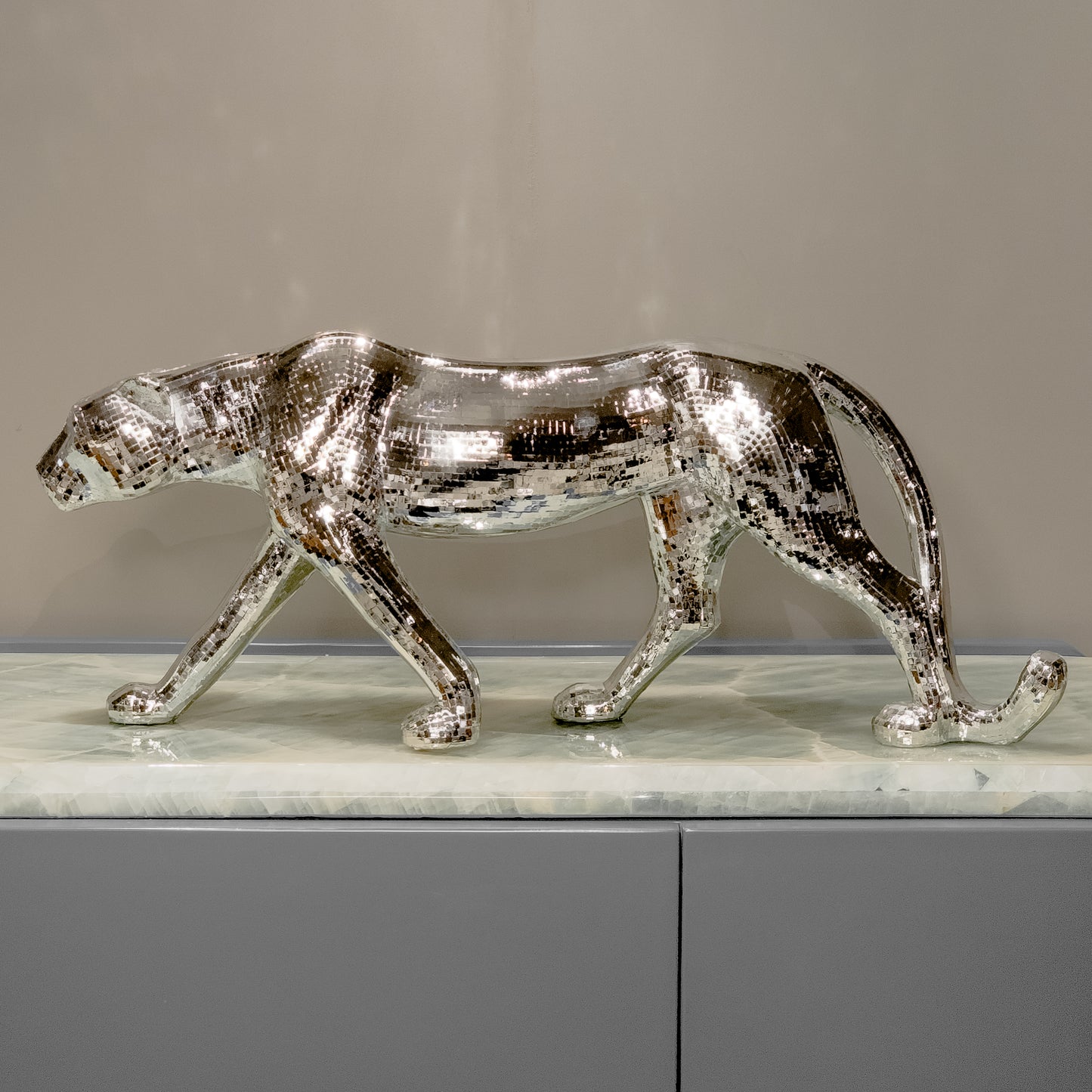 Chrome silver panther decor object in dynamic walking pose