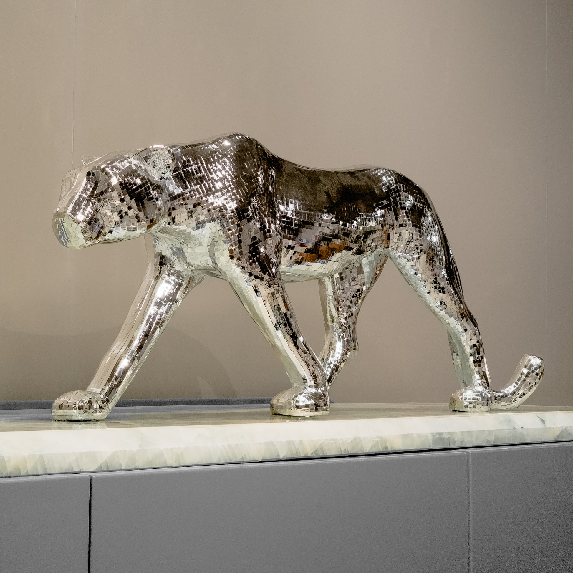 Chrome silver panther decor object in dynamic walking pose