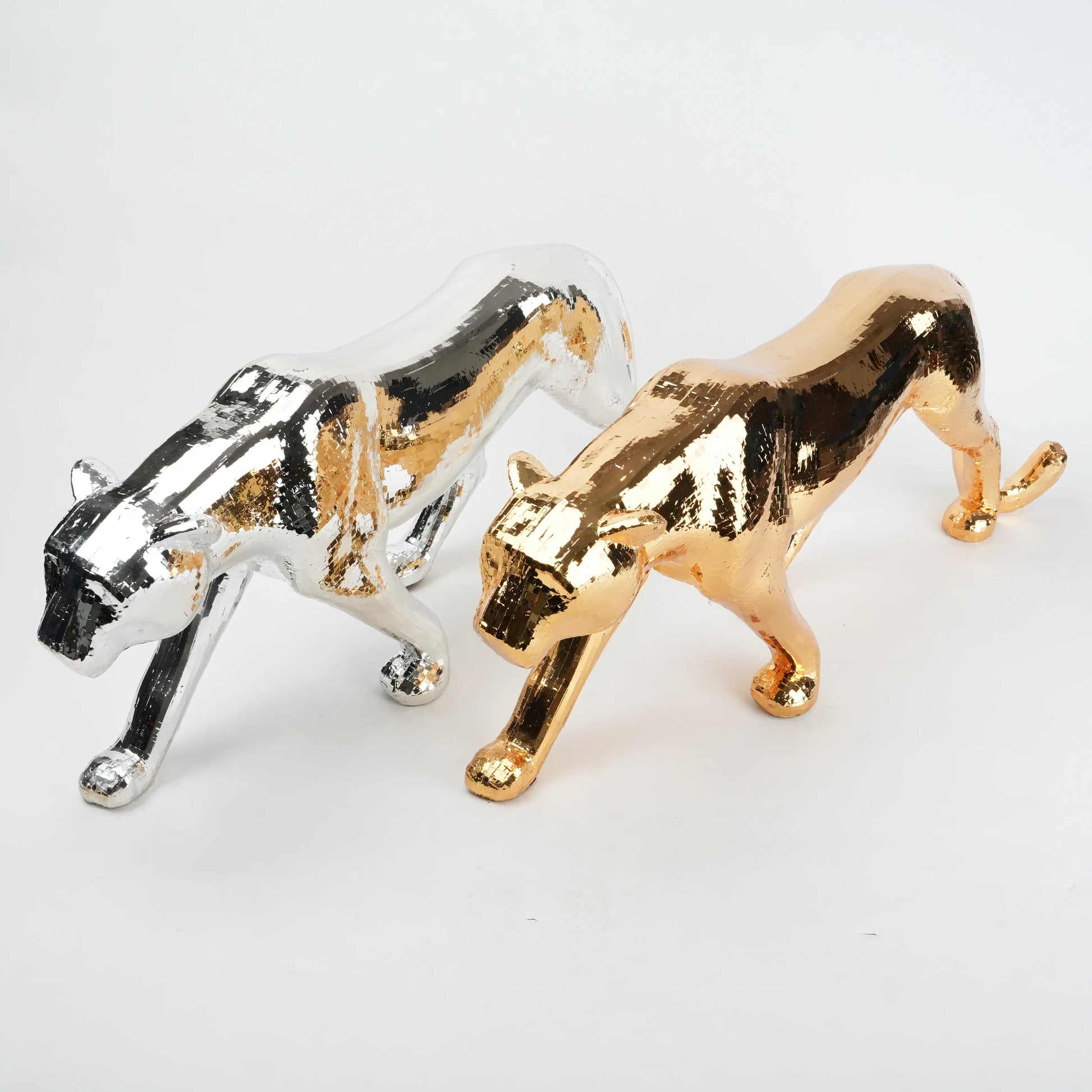 Silver & rose-gold panther pair on white