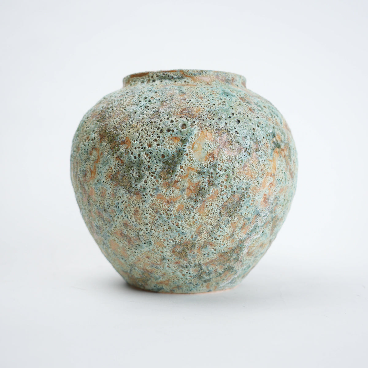 Speckled aqua vase, lava-textured front