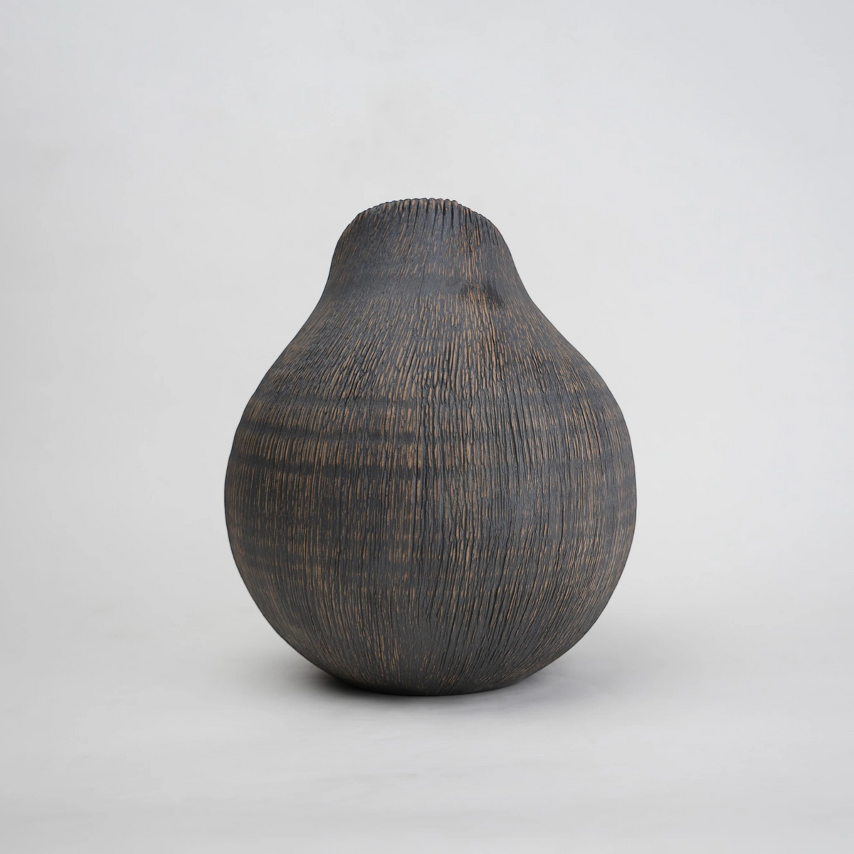 Textured charcoal gourd vase, side angle