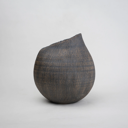 Textured charcoal vase, raked lines front
