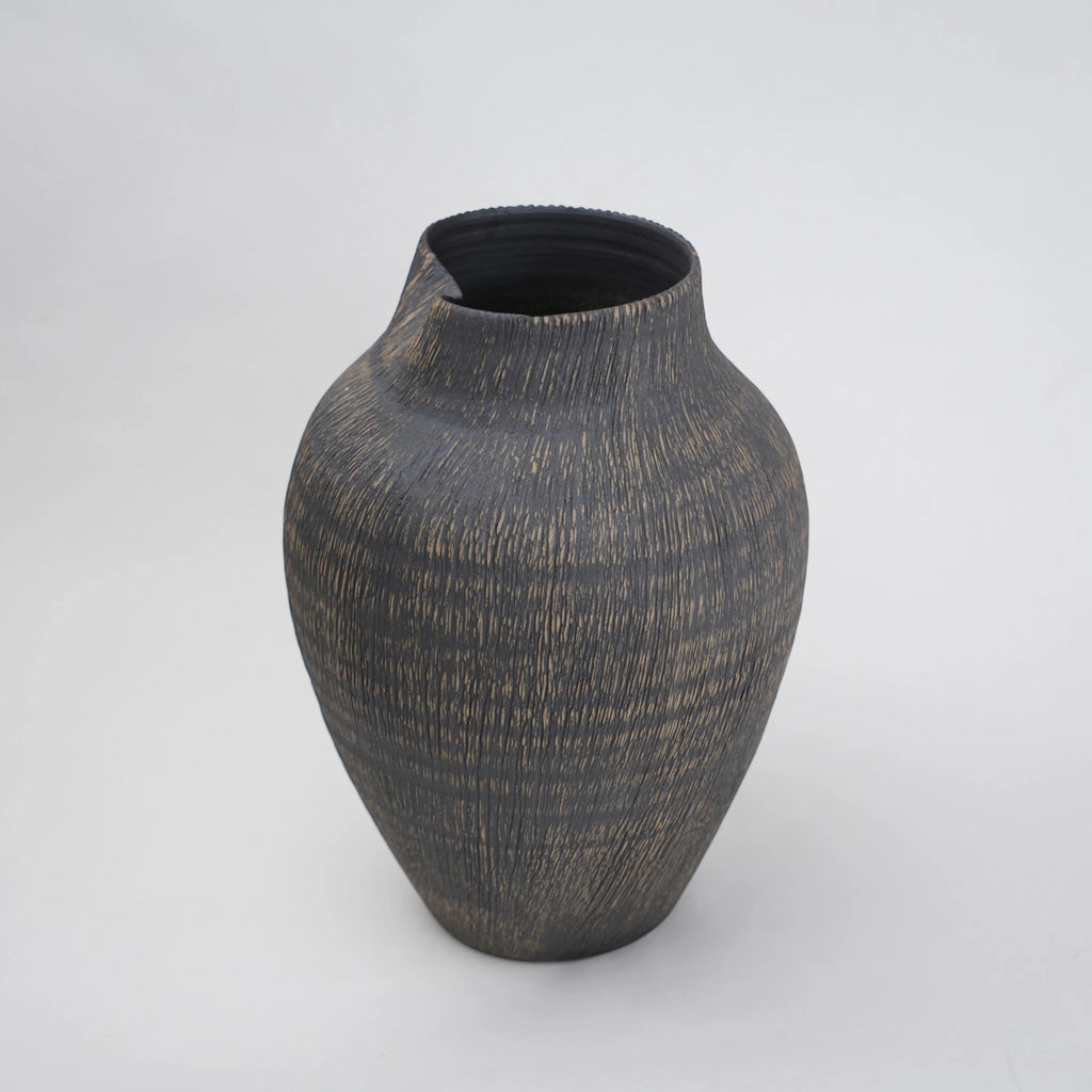 textured charcoal ceramic vase with angled rim