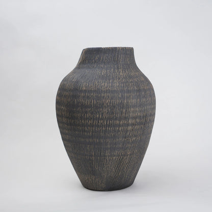 textured charcoal ceramic vase with angled rim