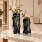 Matte black flow vase elevated angle interior