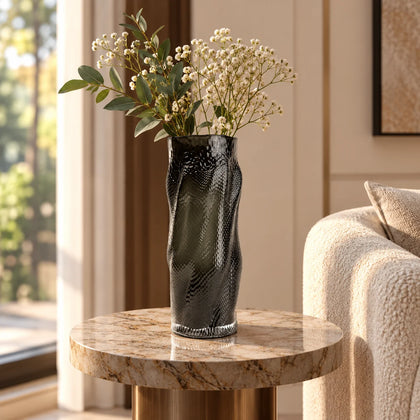 Matte black flow vase elevated angle interior