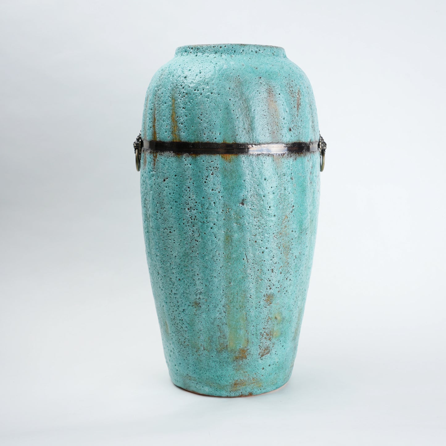 Turquoise patina vase w/ lion rings, front