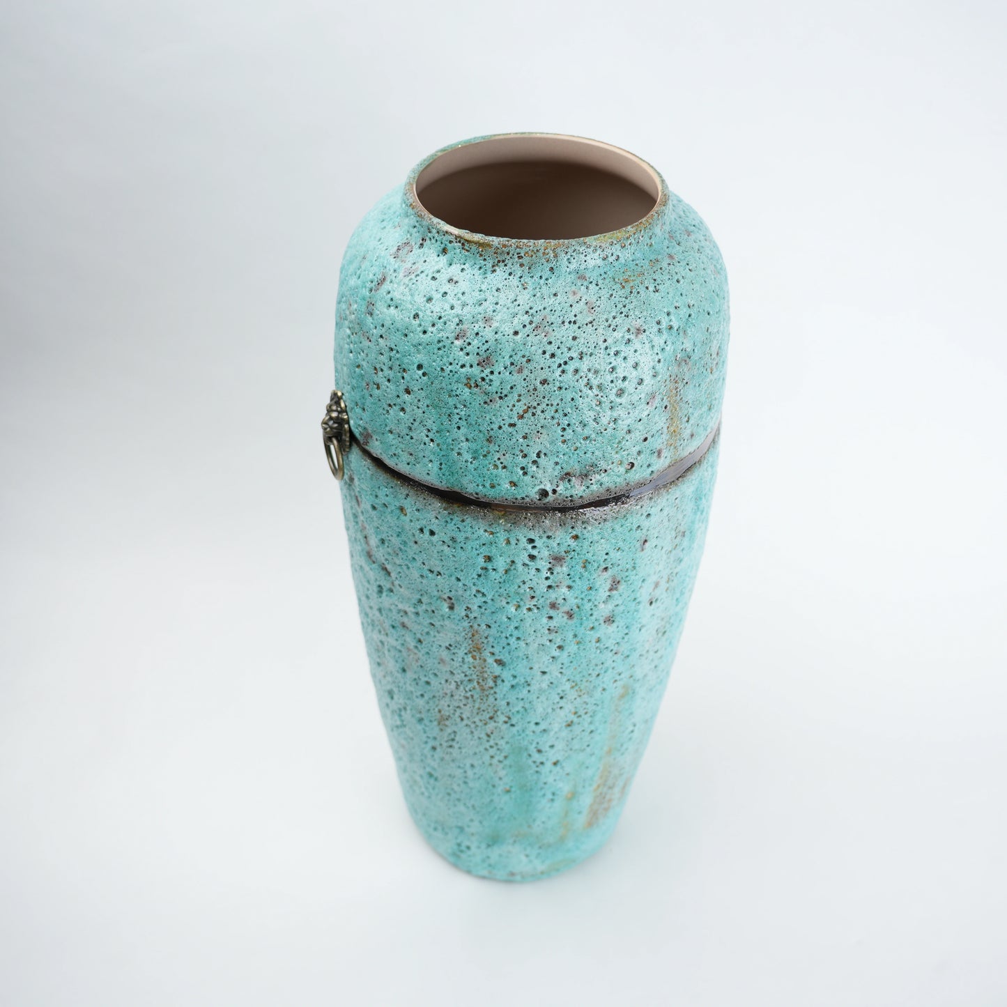 Tall turquoise patina vase, elevated angle