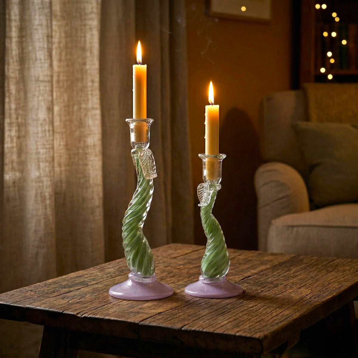 Twist Glow holder pair lit on rustic wood