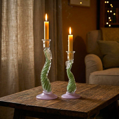 Twist Glow holder pair lit on rustic wood