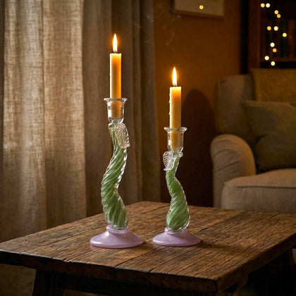 Twist Glow holder pair lit on rustic wood