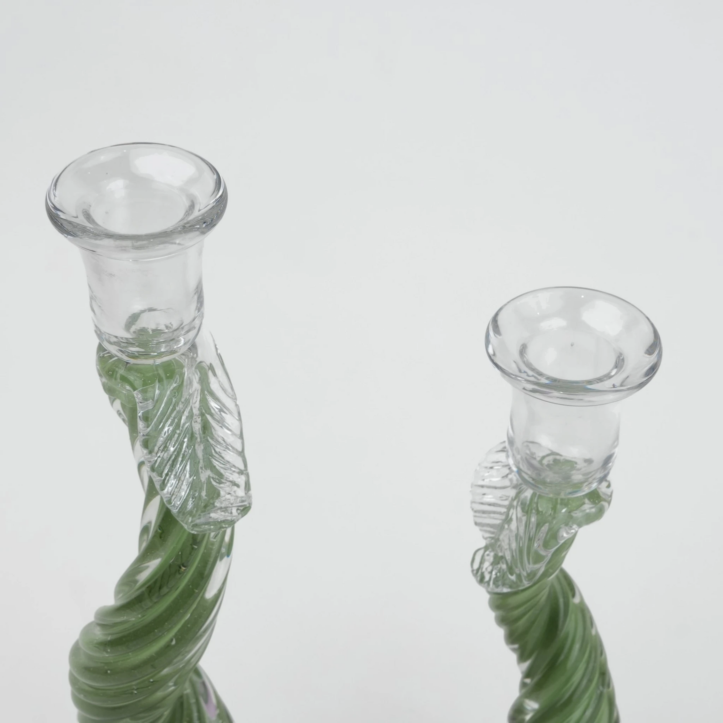 Twisted green art glass candle holders with lavender base and clear candle cup