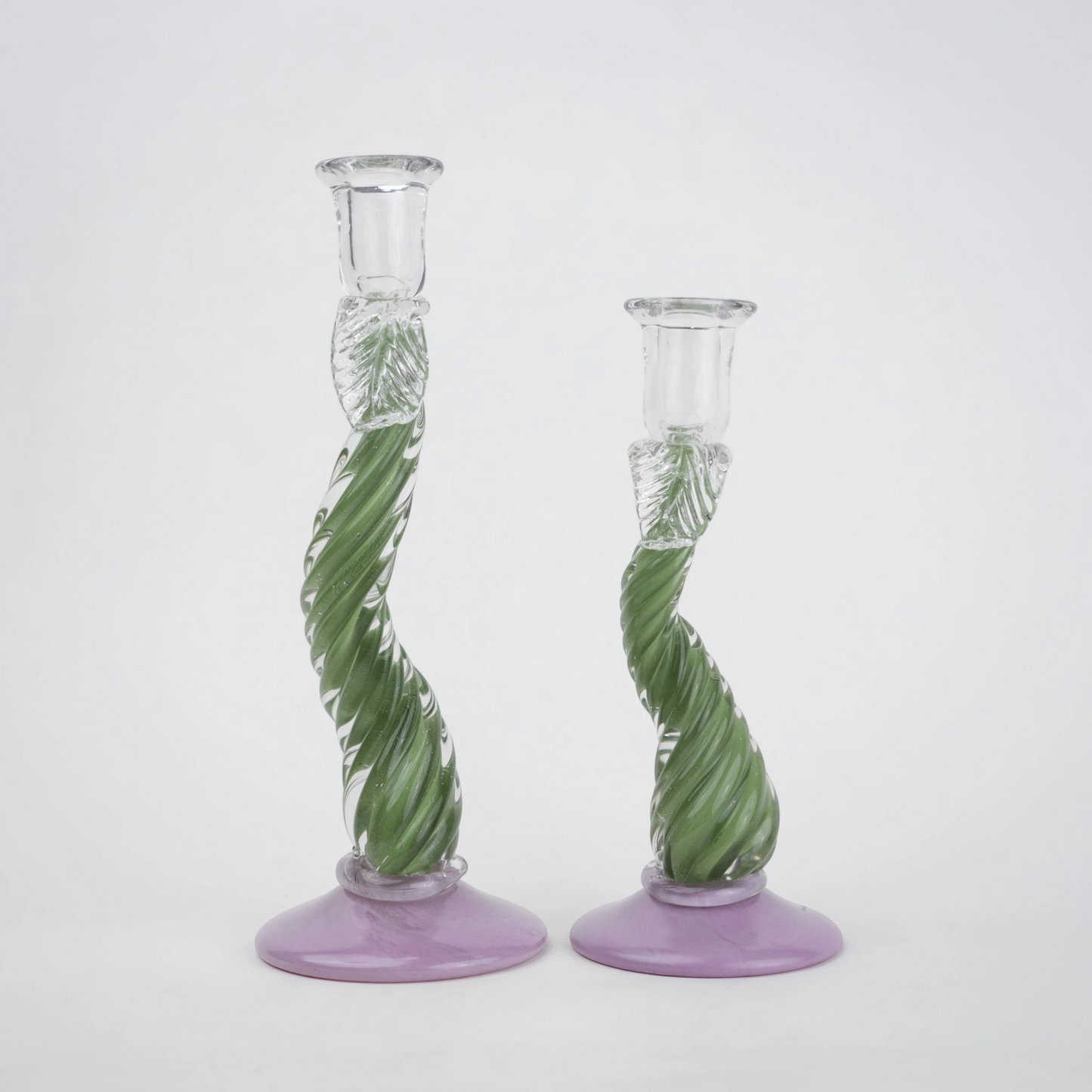 Twisted green art glass candle holders with lavender base and clear candle cup