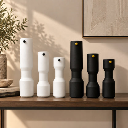 three modern white decorative flower vases with matte finish and black accent detail, minimalist table vases for living room, console or shelf styling