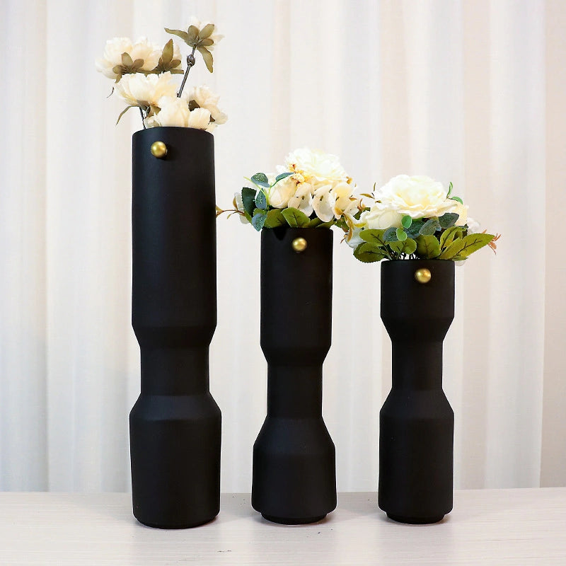 three modern white decorative flower vases with matte finish and black accent detail, minimalist table vases for living room, console or shelf styling