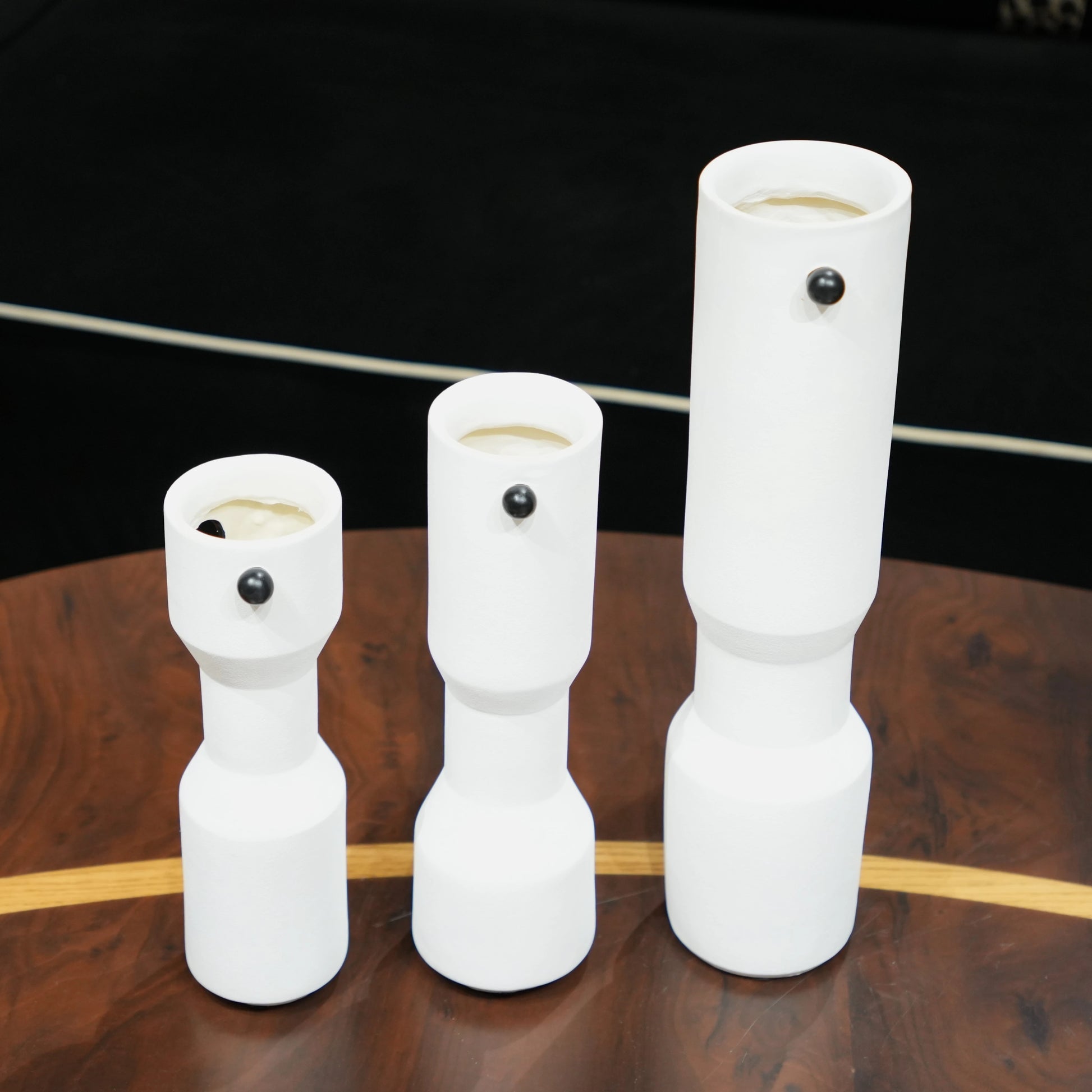 three modern white decorative flower vases with matte finish and black accent detail, minimalist table vases for living room, console or shelf styling
