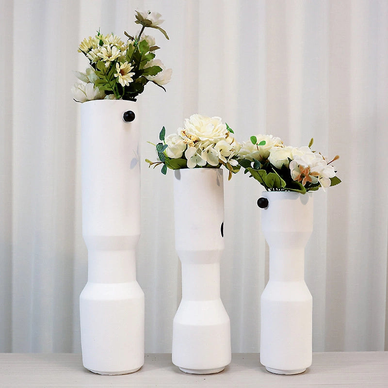 three modern white decorative flower vases with matte finish and black accent detail, minimalist table vases for living room, console or shelf styling