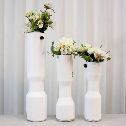 three modern white decorative flower vases with matte finish and black accent detail, minimalist table vases for living room, console or shelf styling