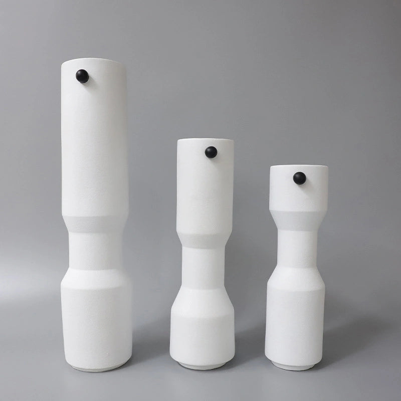 three modern white decorative flower vases with matte finish and black accent detail, minimalist table vases for living room, console or shelf styling