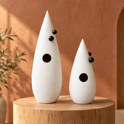 Abstract white decorative accent featuring gold details for contemporary home decor styling