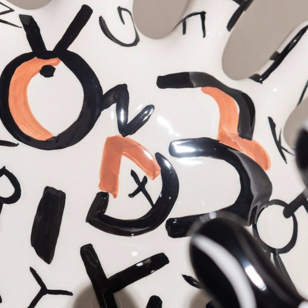 Alphabet vase white close-up letters