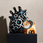 Alphabet vase black w/ orange lion