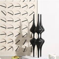 Noir resin column trio w/ screen panel