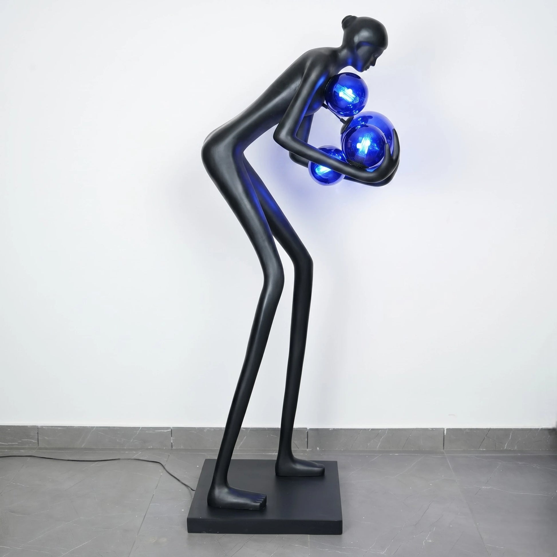 Glow figure lamp, cobalt orbs, side studio