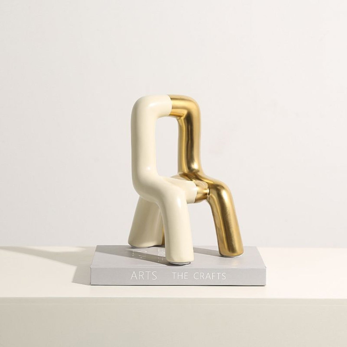 Golden Elegance Chair Sculpture