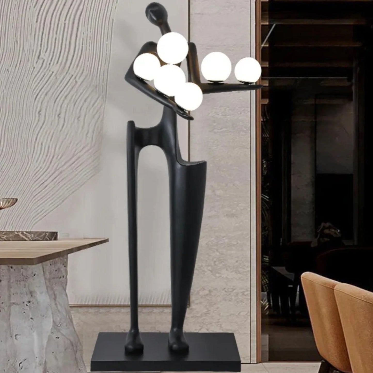 Modern black floor lamp with spherical lights in a room setting.