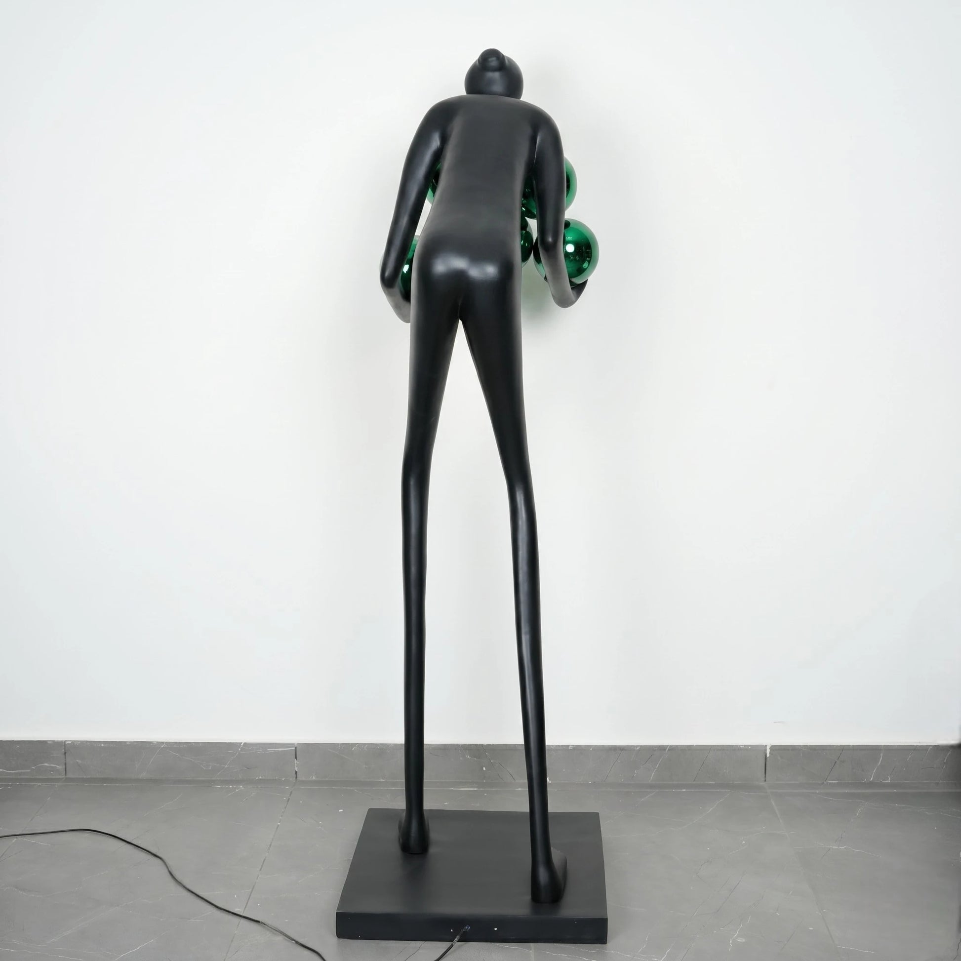 Glow figure lamp, green orbs, rear studio
